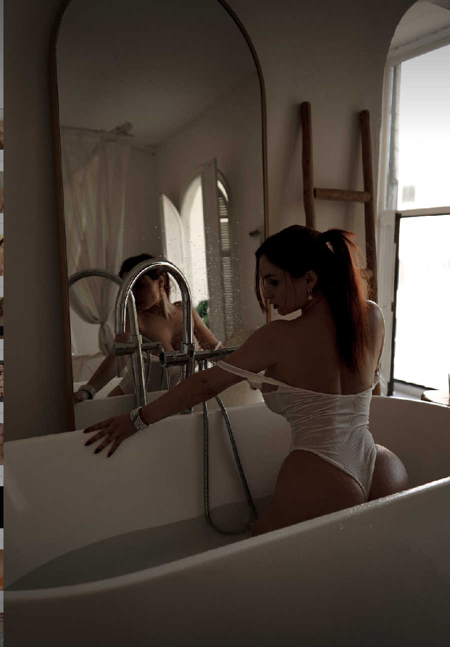 A playful frame from Miranda Faith nude — online in El Kuwait