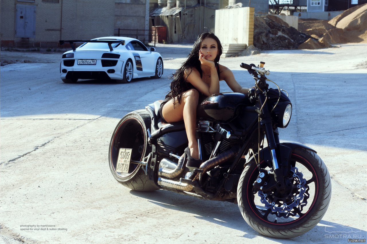 Sexy model Brunettes on a motorcycle in El Kuwait